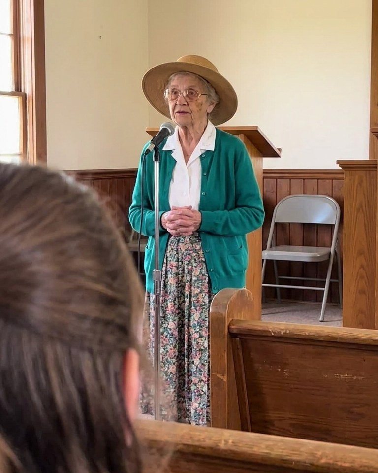 Church lady at the announcement microphone